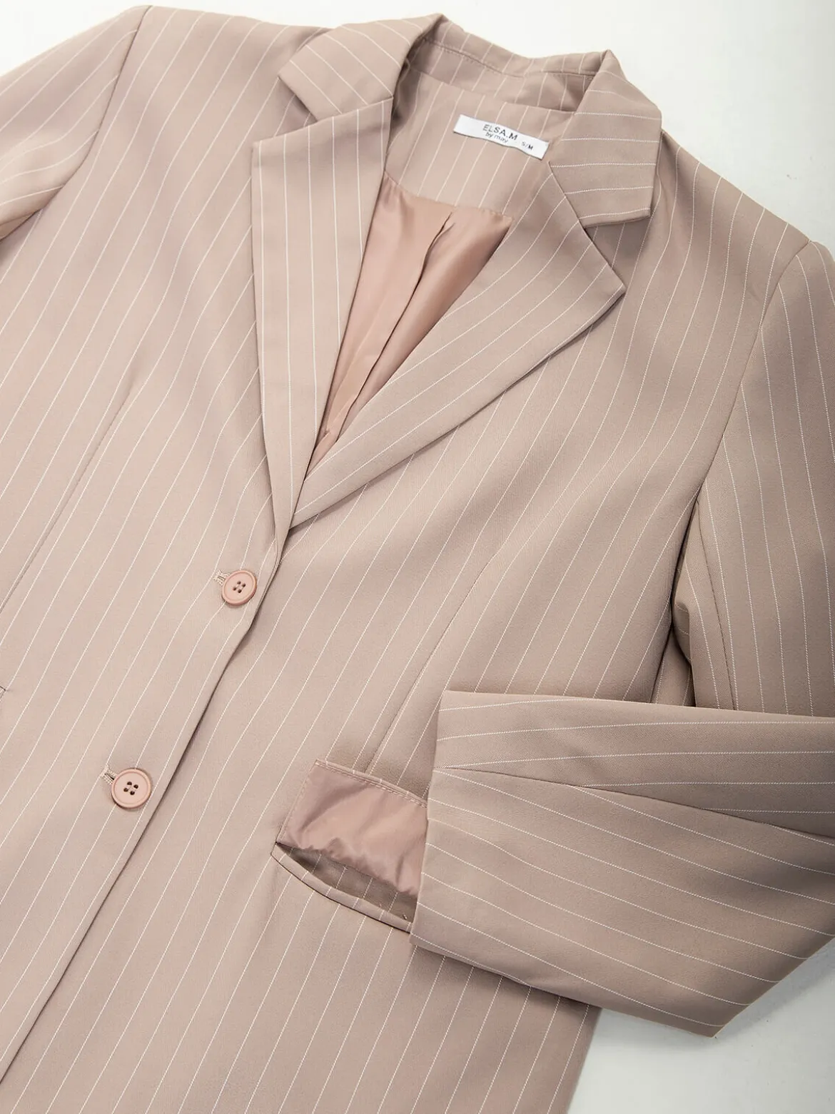 Blazer com riscas diplomáticas