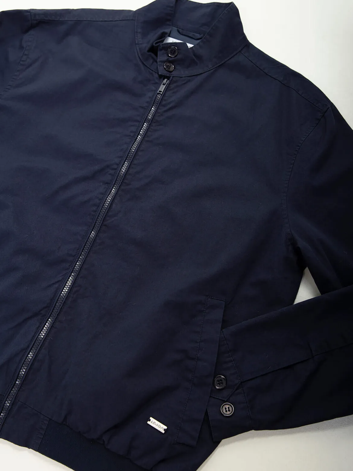 Bomber azul marinho em sarja
