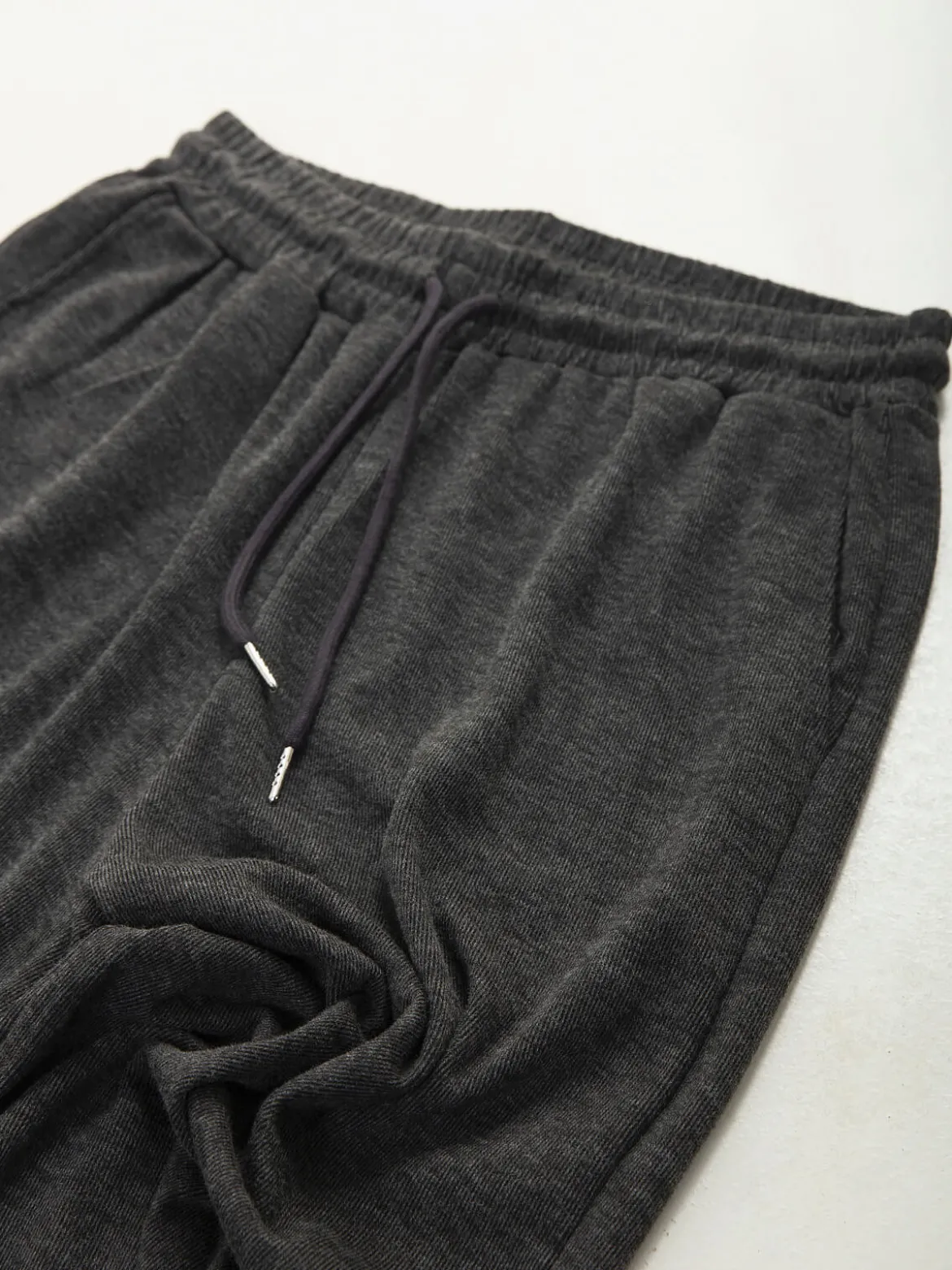 Calças jogger em malha canelada