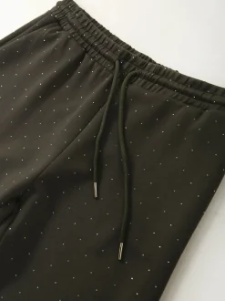 Calças malha com strass
