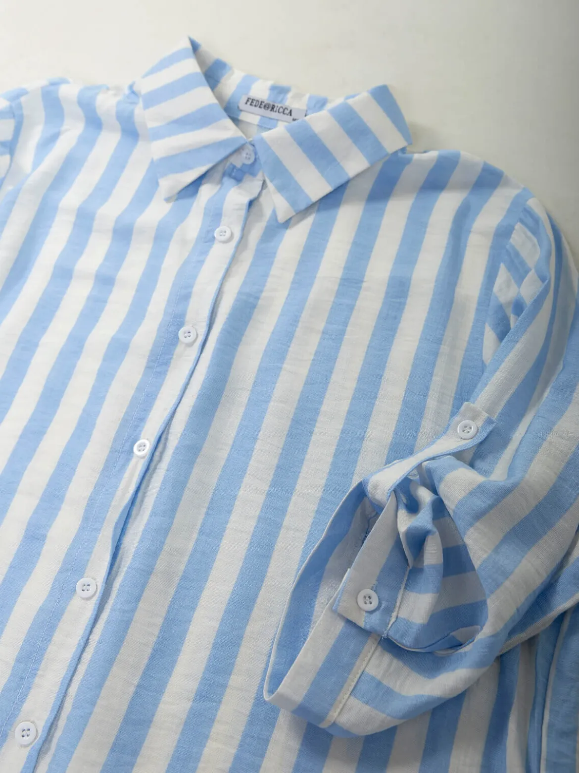 Camisa às riscas manga 3/4