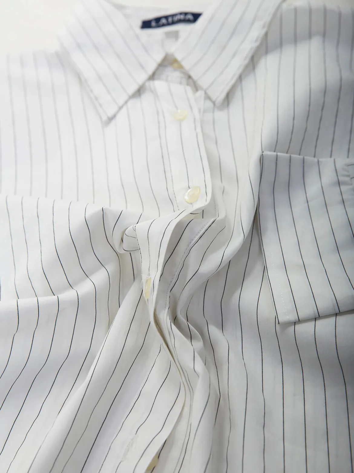 Camisa às riscas manga 3/4